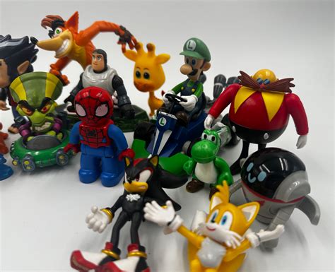 Lot Of 15 Assorted Disney Nintendo Sonic Luigi Nemo Figurines Cartoon ...