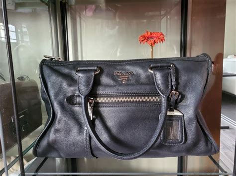 Price off!! Prada sling bag, Women's Fashion, Bags & Wallets, Handbags ...