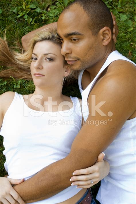 Couple Laying On Grass Stock Photo | Royalty-Free | FreeImages