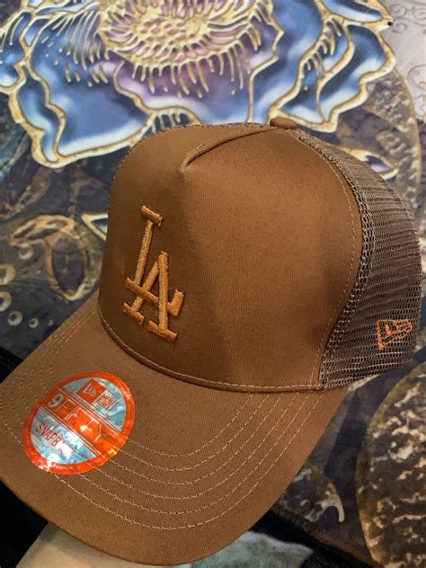 LA NEW ERA TRUCKER CAP, Men's Fashion, Watches & Accessories, Cap ...