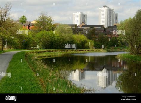 Forth and Clyde Canal and high rise flats in Maryhill in Glasgow ...