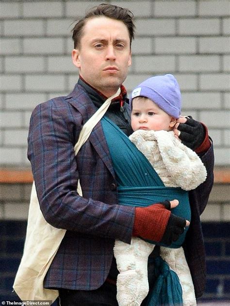 Kieran Culkin puts on a dapper dad display as he steps out for a walk with daughter Kinsey in ...