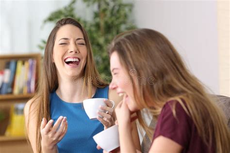 Friends Laughing and Talking Sitting at Home on the Sofa Stock Image - Image of latin ...