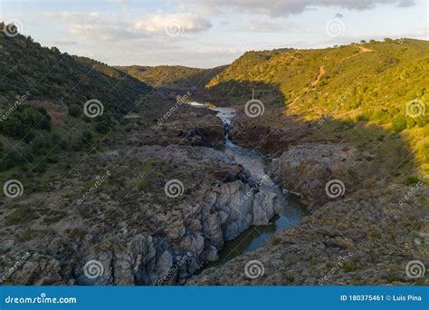 Pulo Do Lobo Waterfall With River Guadiana And Rock Details At Sunset ...