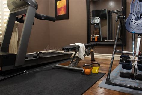 Home Gym in Spare Bedroom with a Treadmill, Bench, and Weights Stock Image - Image of house ...