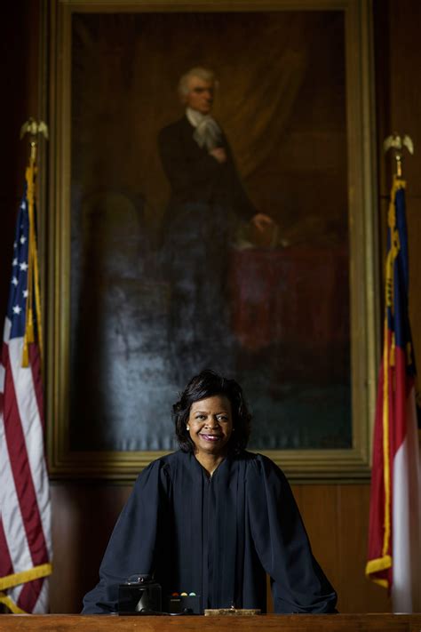 Departing NC chief justice unveils panel to examine bias | AP News