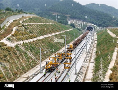 YANTAI, CHINA - SEPTEMBER 19, 2023 - A track-laying train performs ...