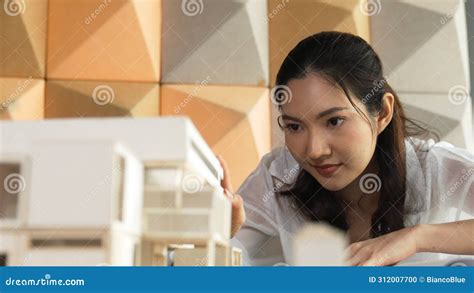 Professional Asian Architect Looking while Checking at House Model. Manipulator. Stock Photo ...