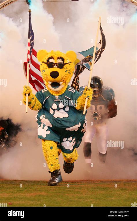 Jaguars mascot Jaxson De Ville leads the team out prior to the NFL football game between the ...