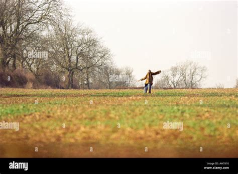 Scarecrow in a field Stock Photo - Alamy