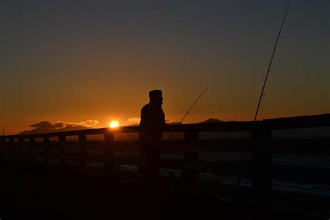 Fishing And Sunset Photograph by Saifon Anaya - Fine Art America