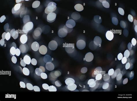 A closeup of white bokeh lights background Stock Photo - Alamy