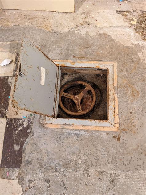 What is this valve under a basement trapdoor floor? Found under a ...