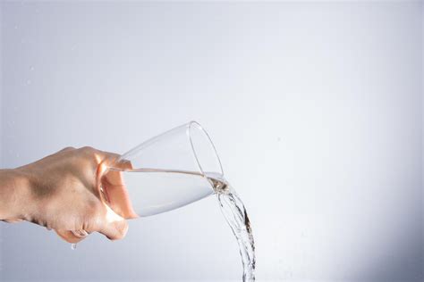 Pouring water out of the glass 1896406 Stock Photo at Vecteezy