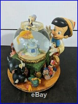 Disney Pinocchio Snowglobe Globe Plays Toyland By Victor Herbert ...