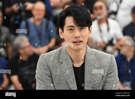 Actor Teo Yoo poses for photographers during a photo call for the film ...