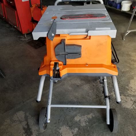 RIDGID TABLE SAW ON FOLDING ROLLING STAND - Big Valley Auction