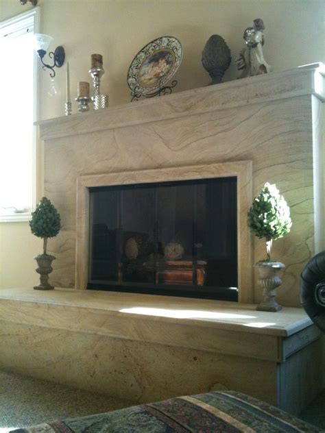 Limestone fireplace using solid slab pieces for hearth and mantle ...