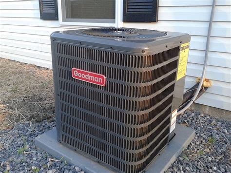 Goodman Central Air conditioner GXS13 running on a warm day - YouTube