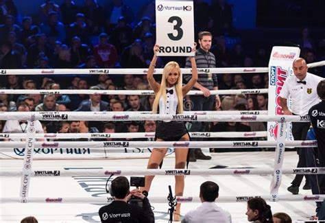 Boxing ring girls holding a board with round number. KYIV, UKRAINE ...