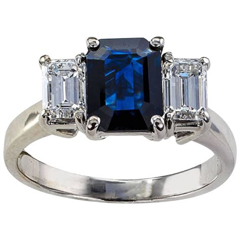 Emerald-Cut Blue Sapphire and Diamond Three-Stone Ring For Sale at 1stdibs