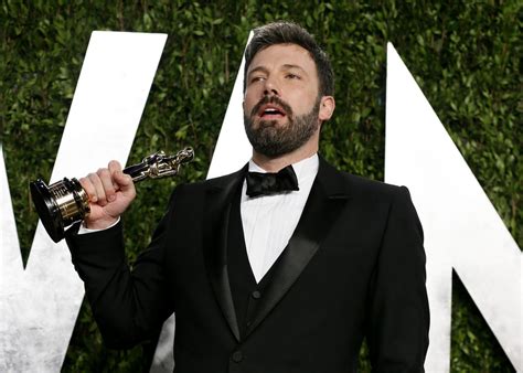 Director Ben Affleck holds his best picture award for his film “Argo ...