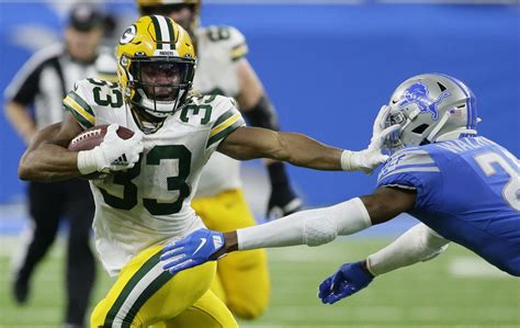 As running backs are devalued, Packers' Aaron Jones enters a contract ...