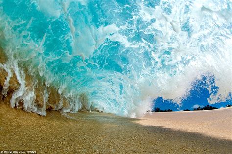 Revealed: How surfer-photographer captures the precise moment the world's biggest waves break ...