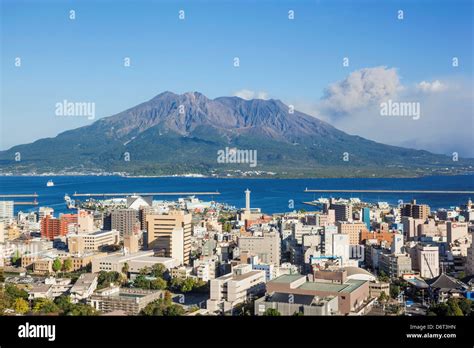 Japan, Kyushu, Kagoshima, Kagoshima City Skyline and Sakurajima Volcano ...