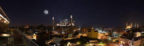 Night Cityscape in Istanbul, Turkey with moon and the Hagia Sophia ...