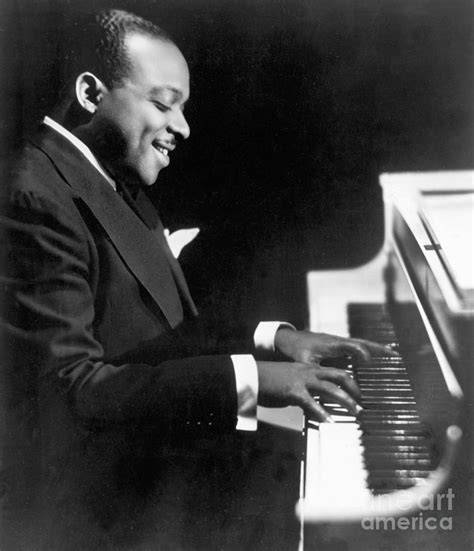 Count Basie Playing Piano #2 by Bettmann