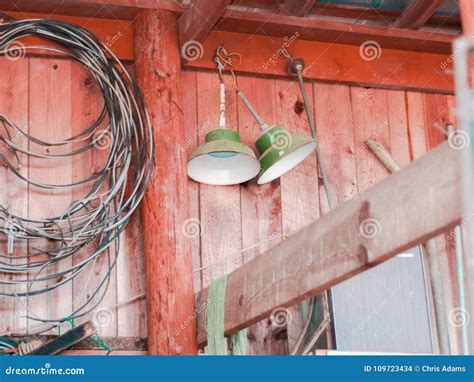 Antique Lights Hanging in a Barn Stock Photo - Image of hanging, electrical: 109723434