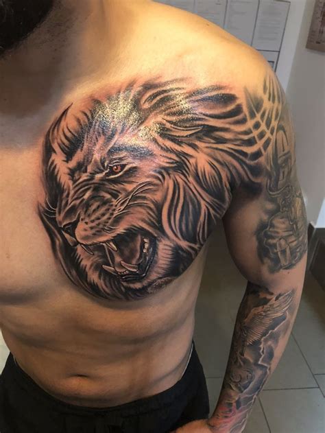 Lion Chest Tattoo | Cool chest tattoos, Lion chest tattoo, Chest tattoo men