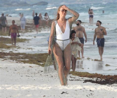 Julianne Hough Beaches It in Plunging Bathing Suit & Fishnet Cover-Up ...