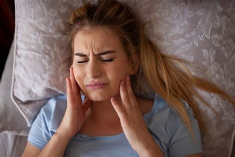 Bruxism or Jaw Clenching: Symptoms and Treatments | Sleepopolis