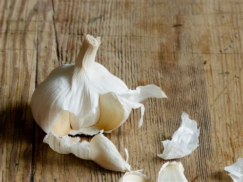 How to Peel Garlic Quickly | SELF