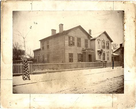 Ulysses S. Grant house | DPL DAMSClapboard house behind picket fence, viewed at an angle from ...