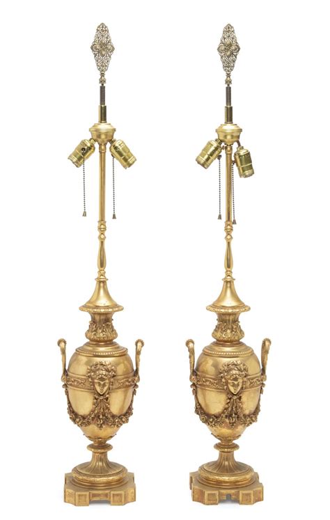 Lot - A pair of Victor Paillard bronze lamps