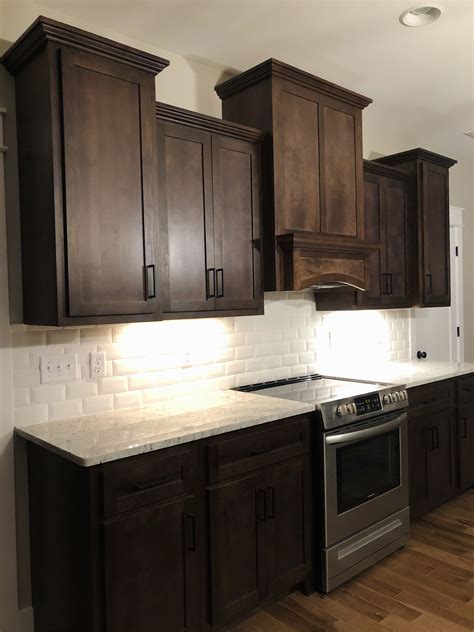 White Kitchen With Dark Backsplash