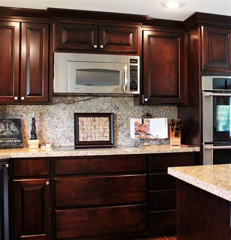 Kitchen__traditional_style__western_maple__dark_color__Raised_panel__floor_to_ceiling_cabinets ...