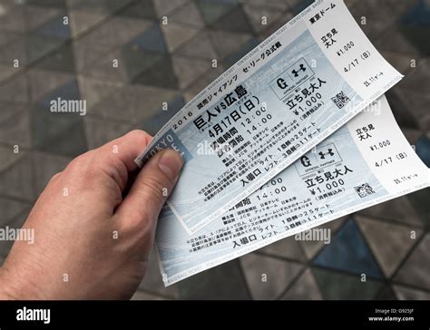 Fan holds tickets to a baseball game at Tokyo Dome, Japan Stock Photo ...