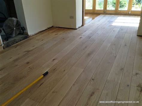 Engineered English Oak Flooring installation - beautiful long & wide floor boards,laid in the ...