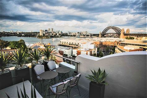 These Sydney Rooftop Bars Deliver Everything From a Stunning View to The Perfect Cocktail