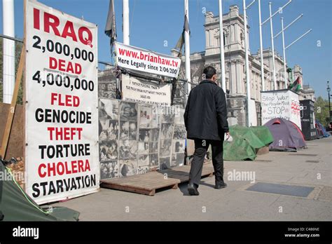 Anti-war protest banners in Parliament Square outside the Houses of Parliament in Westminster ...