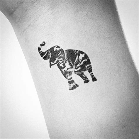 Small Abstract Elephant Tattoo Design | Inku Paw