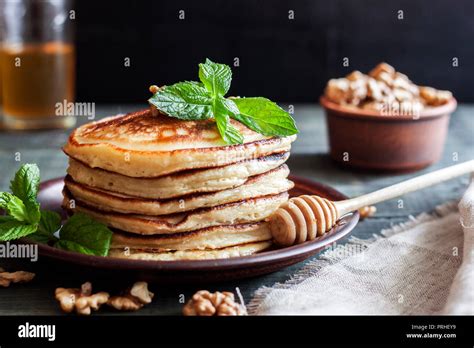 pancakes with honey and nuts Stock Photo - Alamy