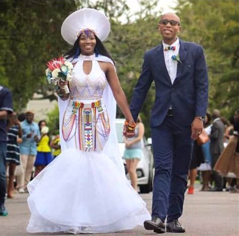 Bride In Modern Zulu Traditional Wedding Dress With Cape, Isicholo Hat ...