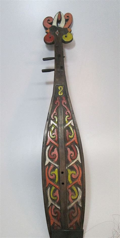 Sold Price: Gorgeous Dayak Sape stringed instrument body with Tribal motifs - January 6, 0116 12 ...