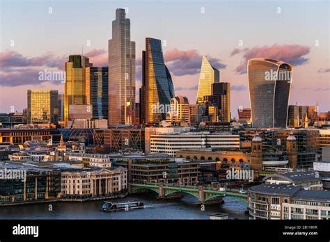 London Financial District - London's City of London Financial District skyline at sunset Stock ...