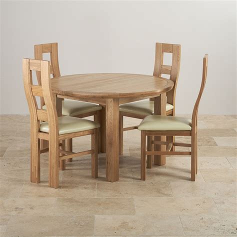 Combine and save with the Knightbridge real oak round extending dining table and 4 cream leather ...